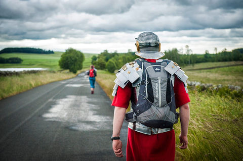 Roman costume ultramarathon runner walks 
