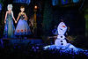Olaf with Anna and Elsa in Frozen Ever After