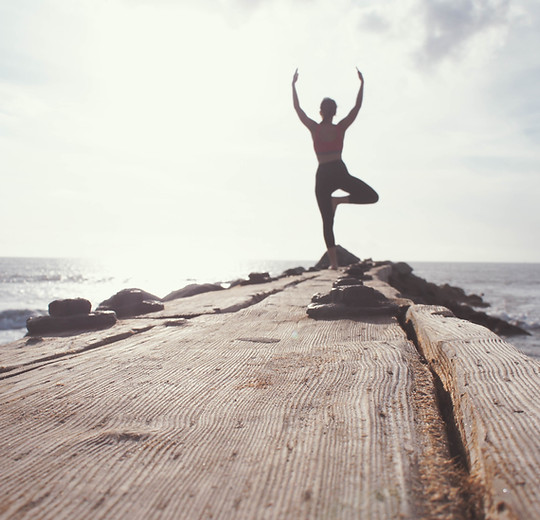 A Yoga Pose by the Beach