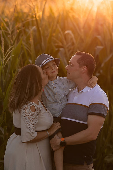 famille au coucher du soleil