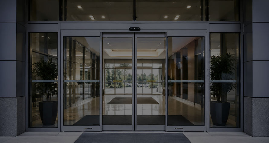 Réparation portes et fenêtres Rive-Nord : entrée commerciale vitrée