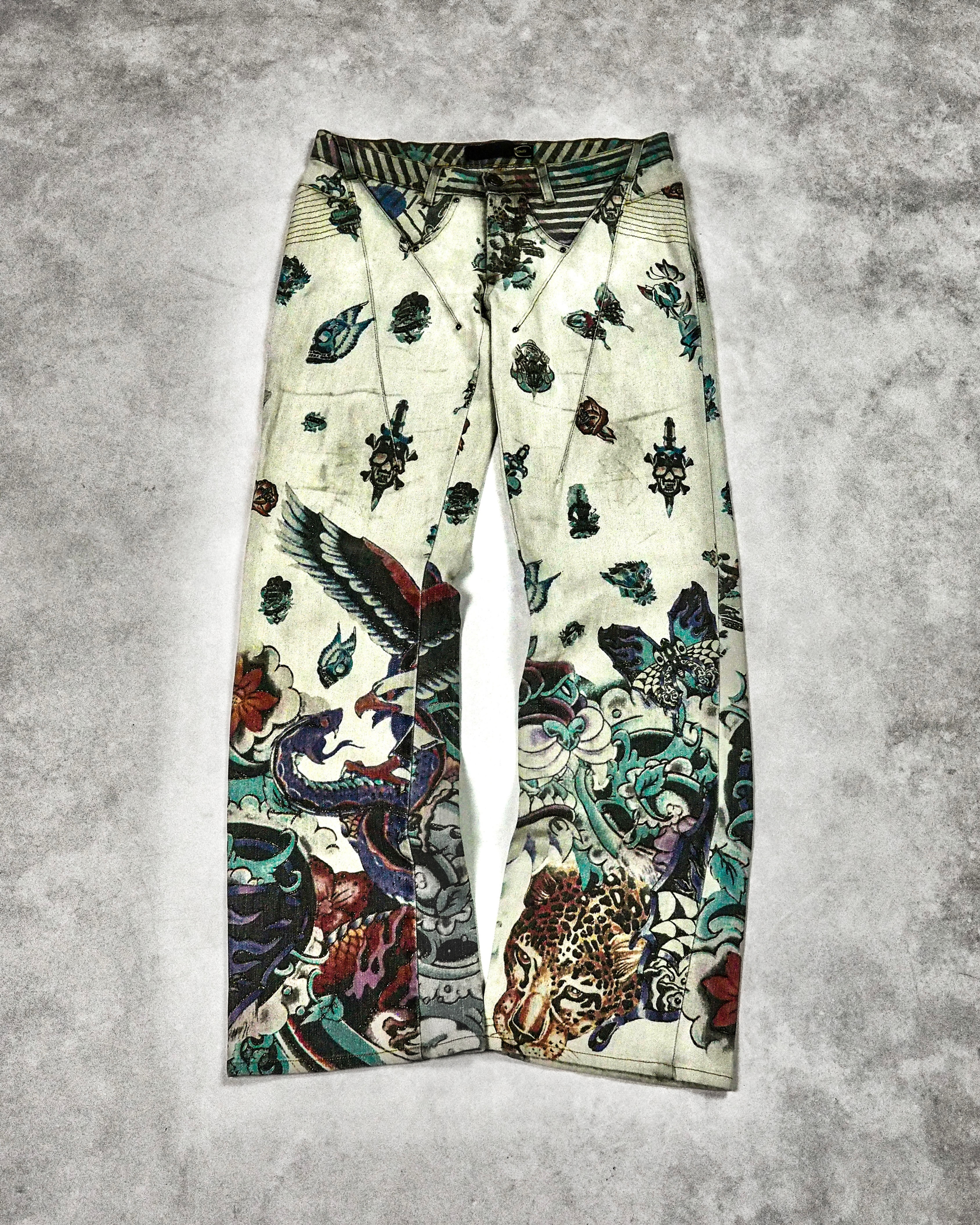 ROBERTO CAVALLI DARTED TATTOO PRINT JEANS