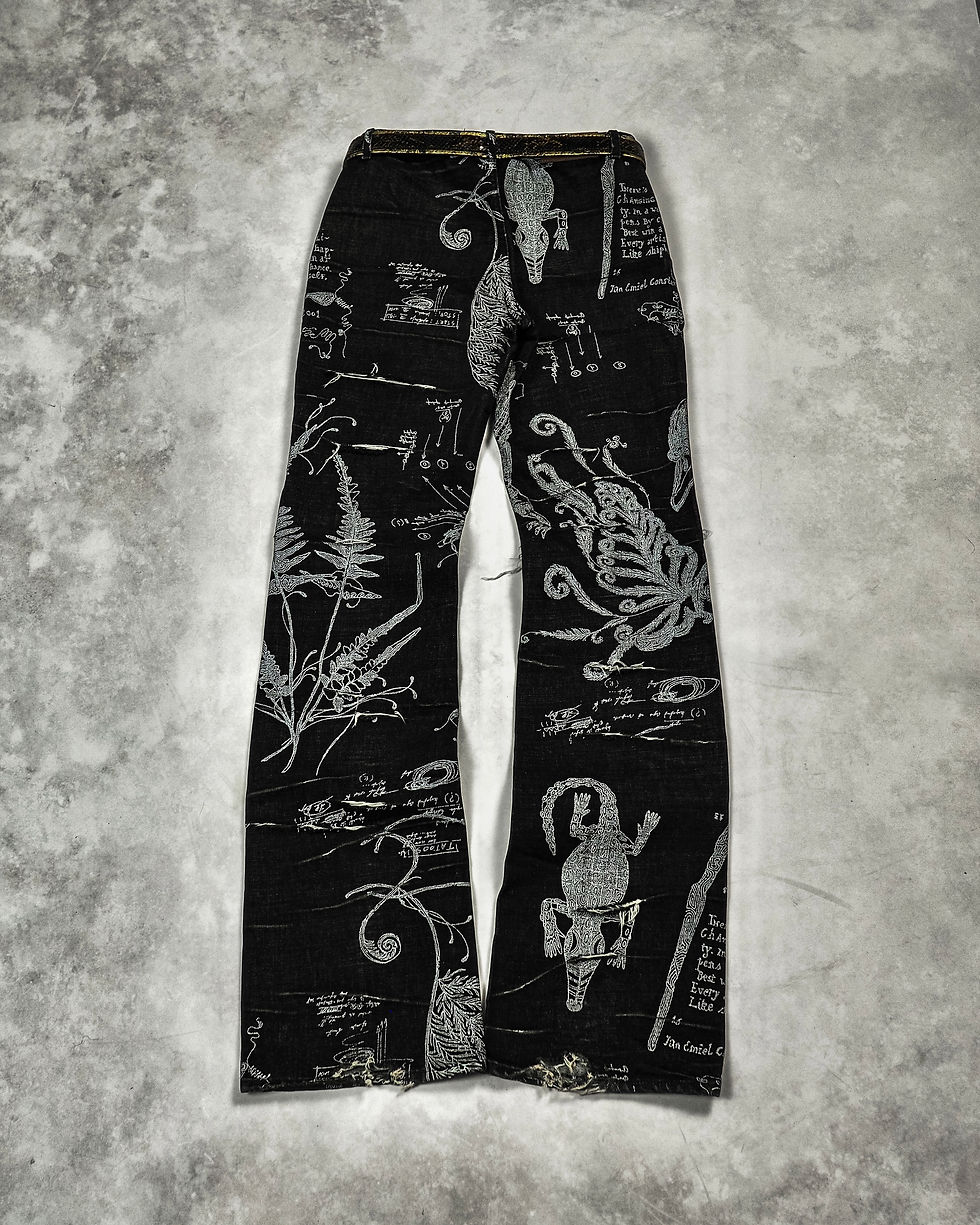 ROBERTO CAVALLI SLASHED TATTOO PRINT FLARED JEANS | Barhaine