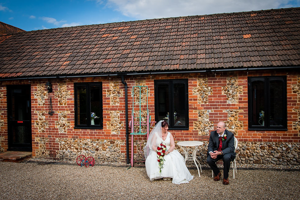 Bride and Groom enjoying a private moment to themselves, Hunters Hall, Dereham