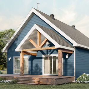 Maison champêtre avec galerie couverte et poutres en bois apparentes