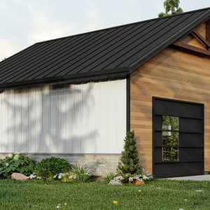 Garage contemporain avec portes noires et toiture métallique