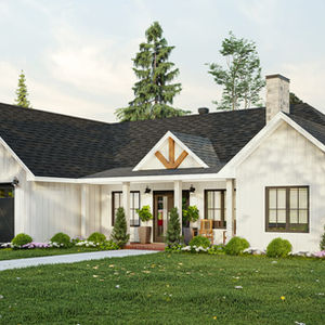 Façade d’une maison moderne de style farmhouse avec garage