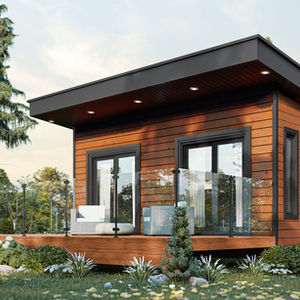 micro habitation contemporaine avec espace de travail vue avant terrasse bois