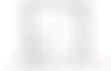 Plan du rez-de-chaussée d’un garage double résidentiel avec deux espaces de stationnement et atelier intégré