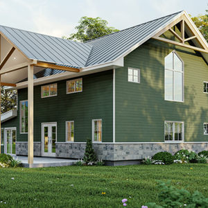 Façade avant d’un chalet rustique moderne avec toiture métallique