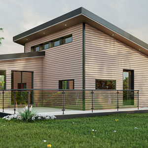 Chalet moderne avec rez-de-jardin construit sur un terrain en pente.