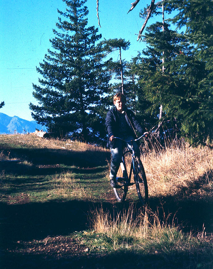 John Riding his Bike in 1970.jpeg