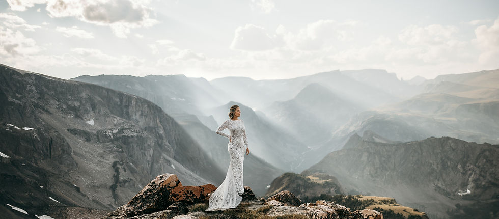Bride overlooking the Montana mountains during a luxury Red Lodge wedding
