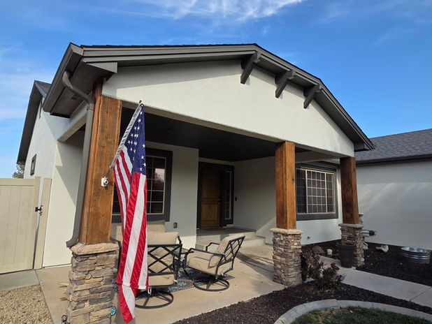 Full exterior house painting in Fruita, Colorado, including stucco and trim by Prime Painting Experts.