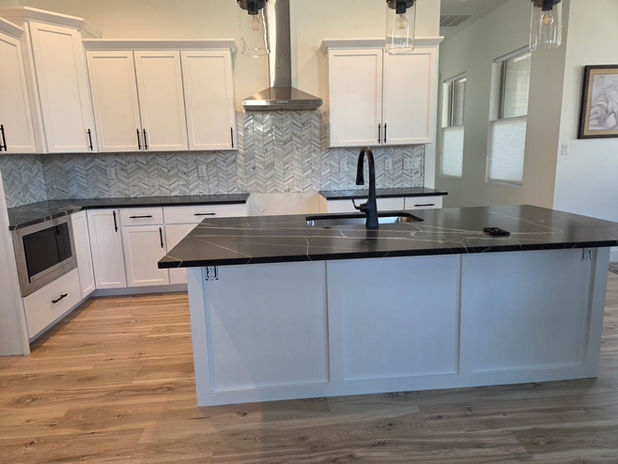 Professional white kitchen cabinet painting in Grand Junction by Prime Painting Experts.