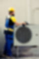 technician-working-air-conditioner.jpg