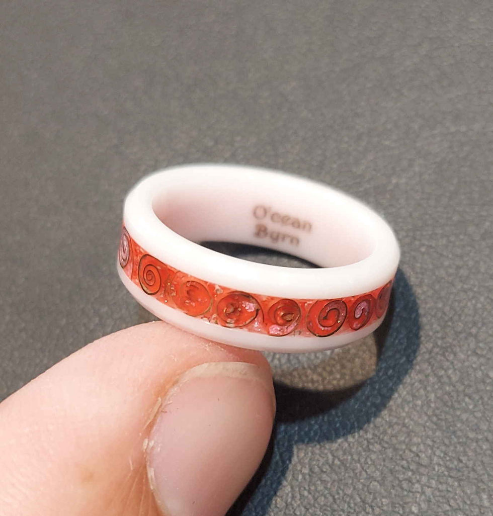 Brass spirals inlayed in White Ceramic w/Pink Glow