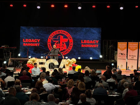 LED video wall on a church stage displaying bright worship graphics during an event