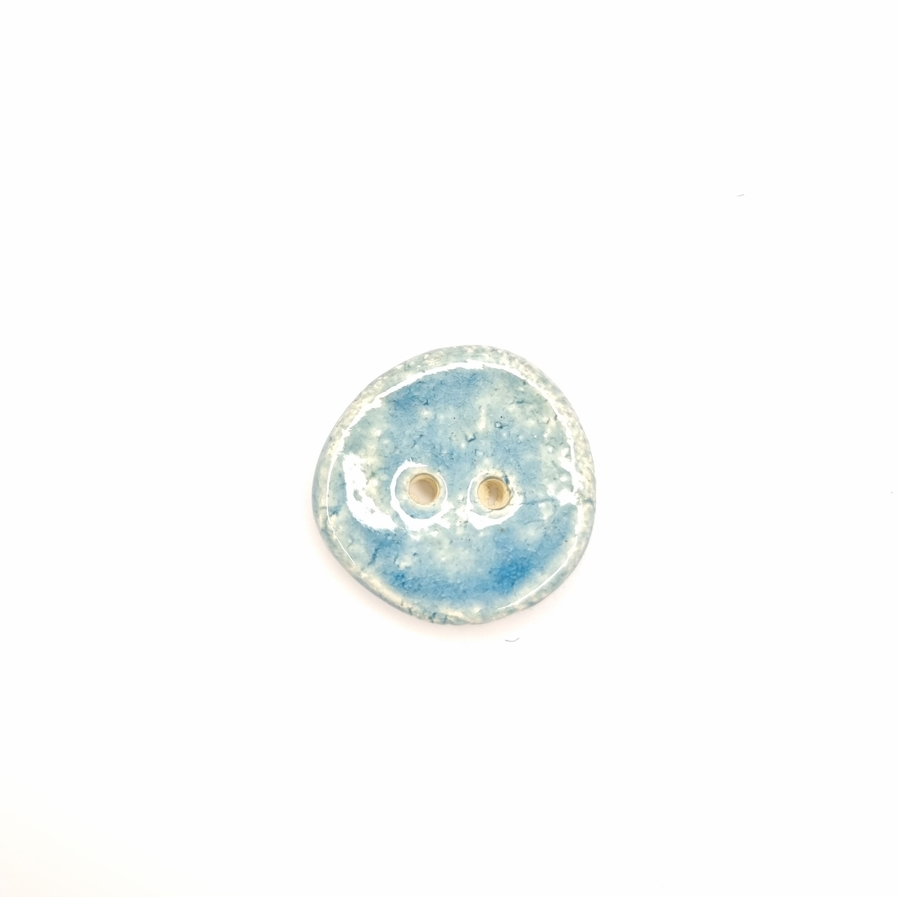 Ceramic button