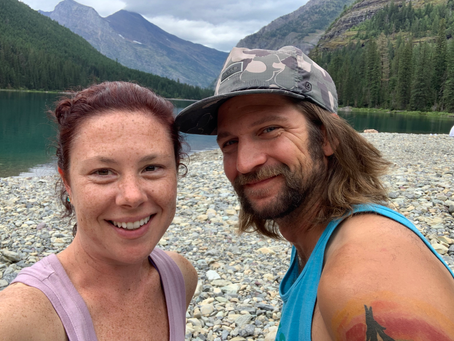 Suzy and billy pose after hiking to Avalanche Lake.
