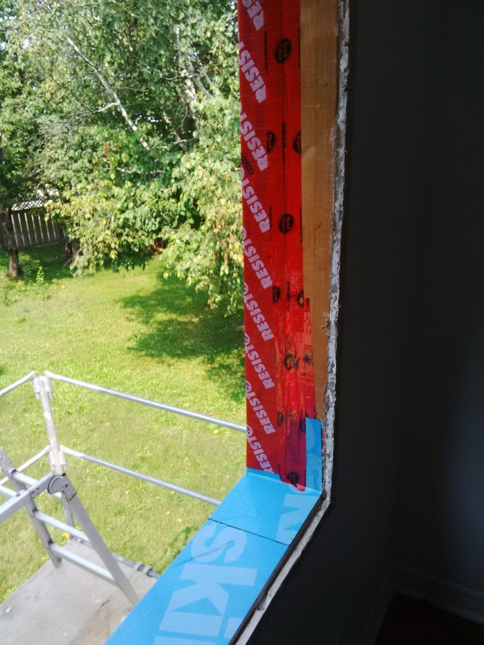 Blueskin window tape for a weather barrier