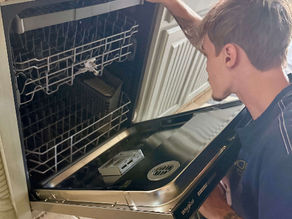 Image of dishwasher repair in Tulsa with professional appliance service tools