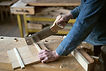 Carpenter Cutting Wood