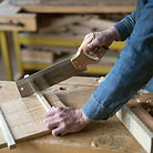 Carpenter Cutting Wood
