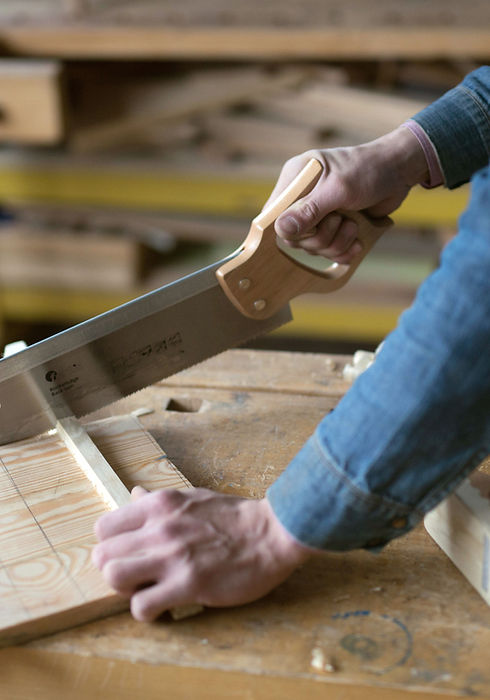 Carpenter Cutting Wood