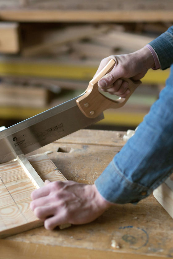 Carpenter Cutting Wood