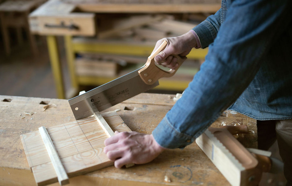 Carpenter Cutting Wood