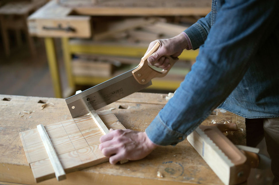 Carpenter Cutting Wood