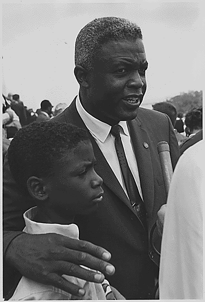 Jackie Robinson and his son David at the March on Washington, 1963. Public Domain.