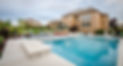 backyard pool area with concrete deck