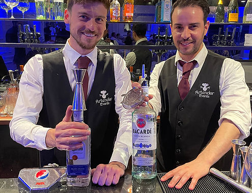 Bartenders making cocktails