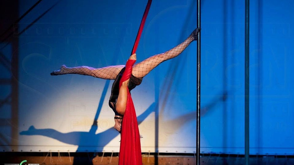Pole Dance Universe with Leesi L'Ru in an inverted splits using Pole Silks