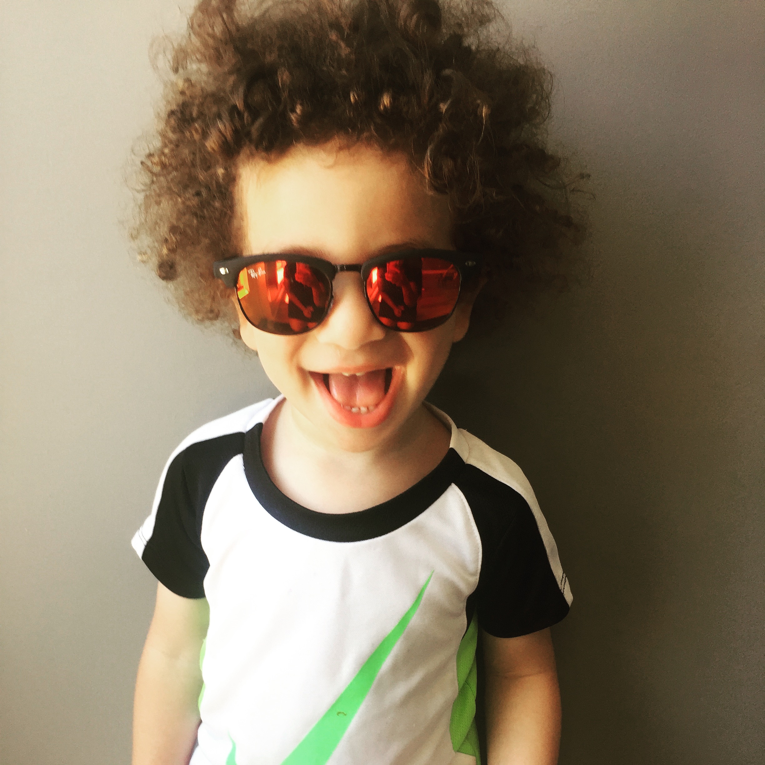 This cutie in his new Ray Ban shades