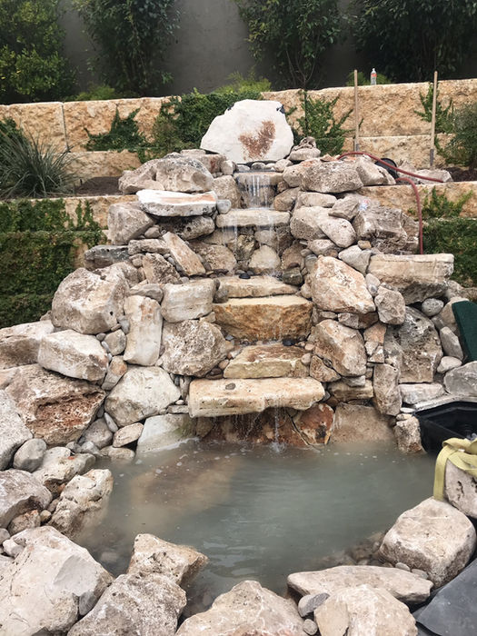 San Antonio stacked stone waterfall feature with mist