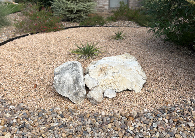 Woods of Shavano xeriscape landscape design in San Antonio with native plants and flagstone paths.