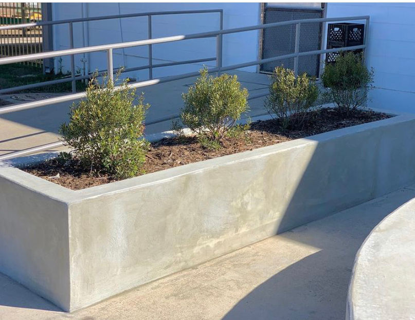 San Antonio concrete planter box along a patio edge