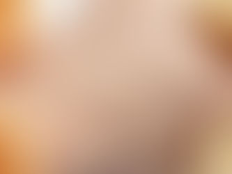 Water droplets on a hand surrounded by fresh lemon and orange slices, conveying a fresh and hydrating mood against a neutral background.