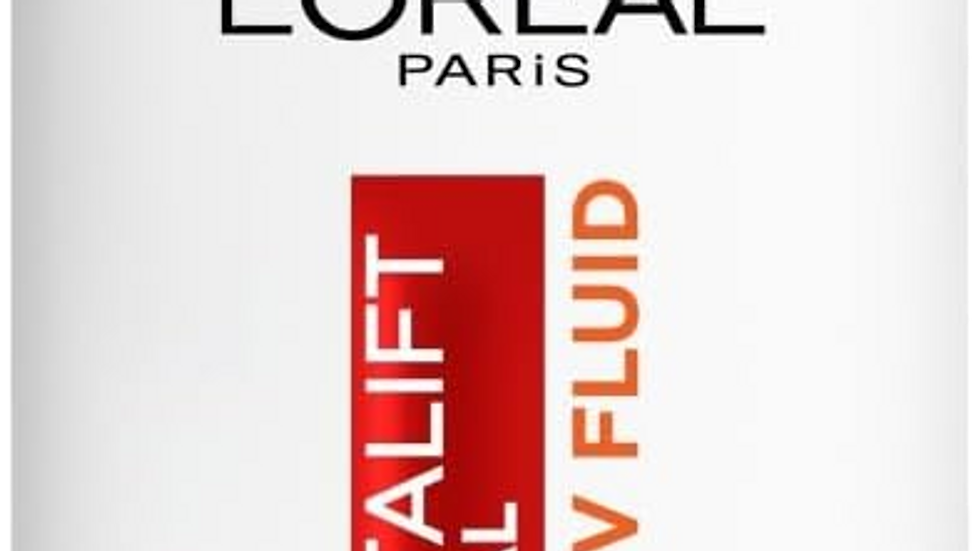 White bottle of L'Oréal Revitalift Clinical Anti-UV Fluid SPF 50+. Minimalist design with red and orange accents. Text emphasizes high UV protection.