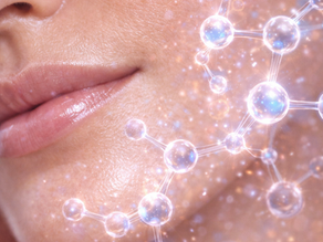 Close-up of a person's face with glowing skin, overlaid with a digital illustration of molecules, creating a futuristic and radiant mood.