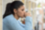 young beautiful sad and desperate hispanic woman suffering depression looking thoughtful a