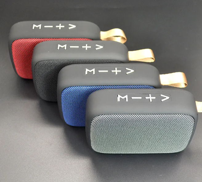 Four Bluetooth wireless speakers in red, black, blue, green