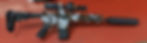 Camouflaged rifle with scope and silencer on an orange background, featuring a white and brown pattern. Text "VIPER PST 1-6x24" is visible.