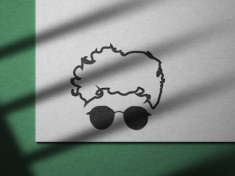 Ava designed a minimalist logo featuring the contour of Vlad's face, capturing his distinct features and signature glasses. Beneath the contour, she added his name in a sleek, caligraphic font.