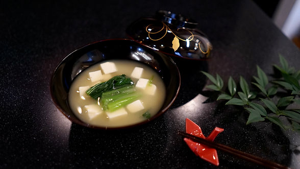 Miso soup with tofu and spinach in a black bowl ABOUT Tokyo Mom's Kitchen