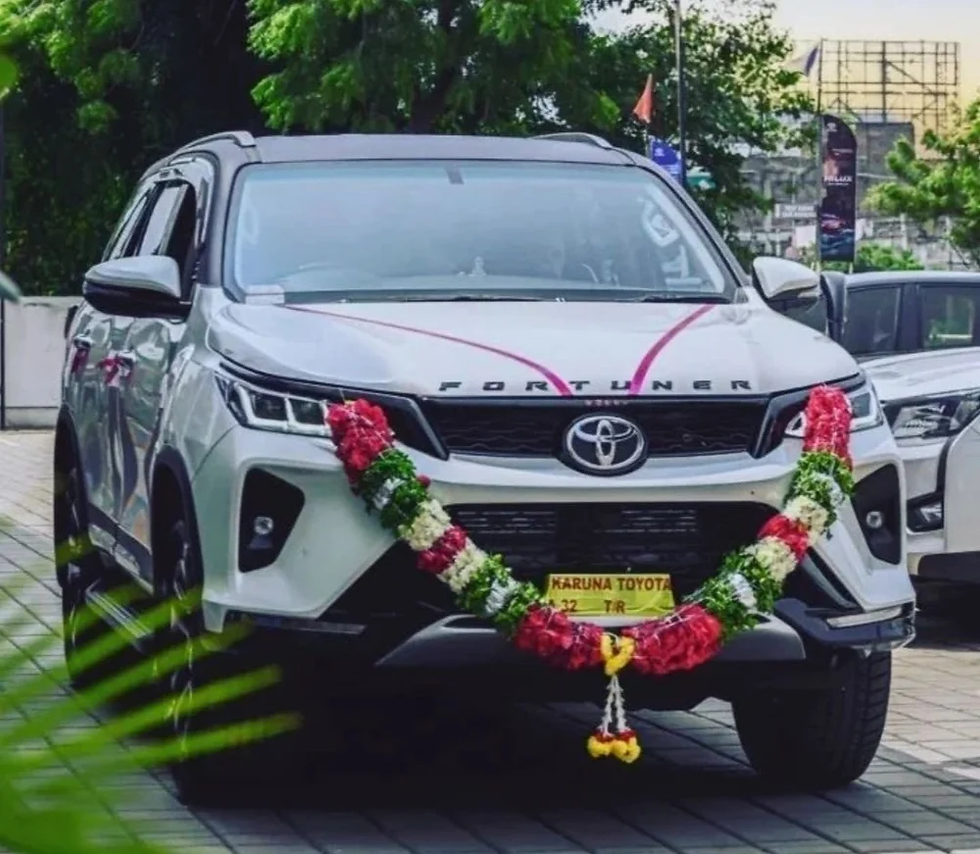 Decorated Toyota Fortuner with flowers.