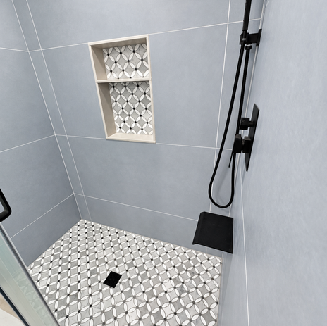 Custom walk-in shower remodel with modern tilework and glass shower enclosure